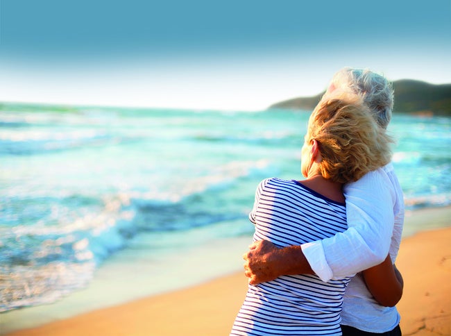 Couple embracing at the beach